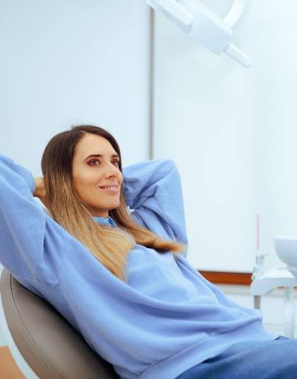 Dental patient relaxing in treatment chair