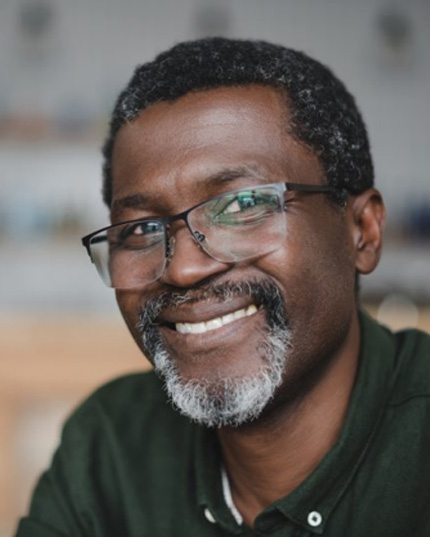 a man smiling with healthy teeth