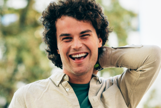 Woman in dental chair opening her mouth for a dental exam