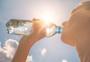 Woman drinking a bottle of water